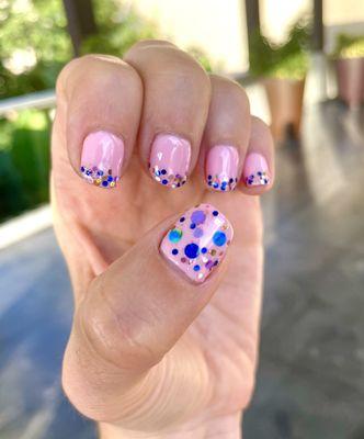 Gel manicure with glitter design