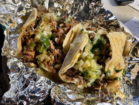 Al pastor and cabeza tacos.