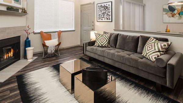 Apartment Living Room with wood floors.