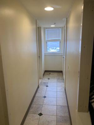 first floor hallway -bathroom and storage closet