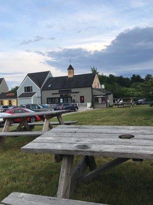 Outside seating! Tables up on the patio and a few picnic tables in the grass!