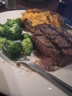 Mid rare filet with side of broccoli and sweet potato.