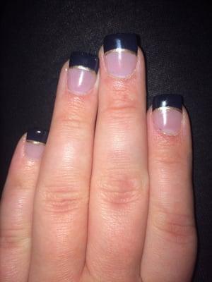 Black tips with gold, perfect for a classy new years nail! :)