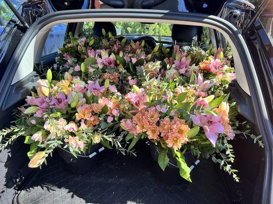 Flowers for our wedding heading to the venue.