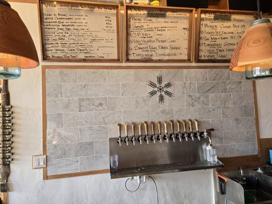 The many taps with a variety of brews and ciders