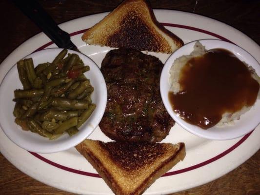 Made to order ribeye, to die for green beans and yummy mashed potatoes with brown gravy.