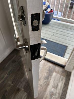 Taped door latch.