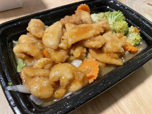 Orange chicken. Simple and fresh- not coated with batter nor sticky sweet syrup. We Loved it.