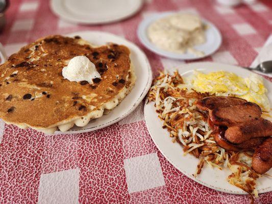 Chocolate Chip Pancakes & Louisiana Hot Links with 3 Eggs and a side of Biscuits & Gravy