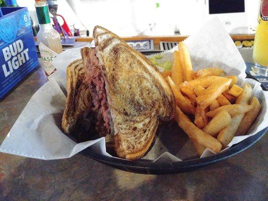 The patty melt with fries.