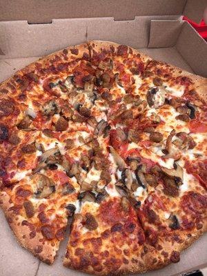 Sausage, pepperoni and mushroom pizza