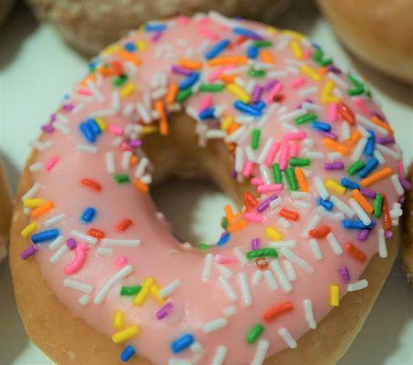 Pink iced w/ sprinkles