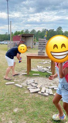 Playing Jenga. In the background you can see another little cute set up for pictures.