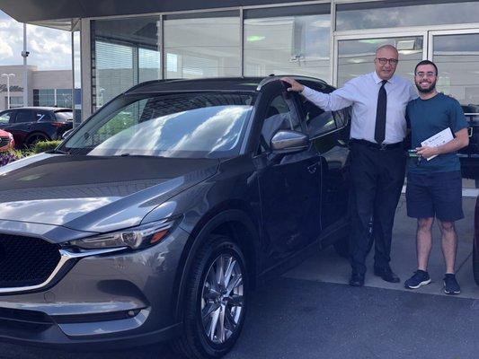 Me and Mo, the dealer I worked with who helped me lease my 2019 Mazda CX-5 GT. I am very pleased with him and my purchase! :-)