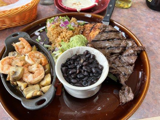 This is the chefs sampler. Steak chicken and shrimp with all the fixins. Chefs kiss. Delicious as f.