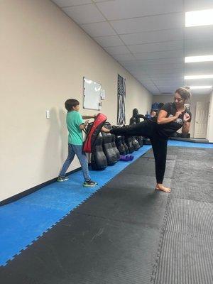 My son and I practicing our KravMaga class.