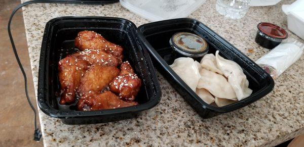 Sesame wings and steamed dumplings. With tax it came out to be $11.92.