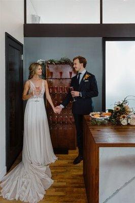 Wooden Bubbly Wall backdrop at The Publishing House. Photo by @lisakathanweddings