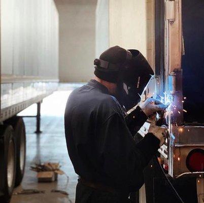 Welding reefer trailer broken hinge.