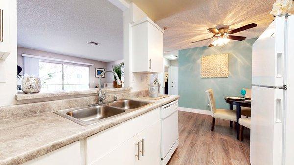 Kitchen and dining area at Mountain Vista Apartment Homes