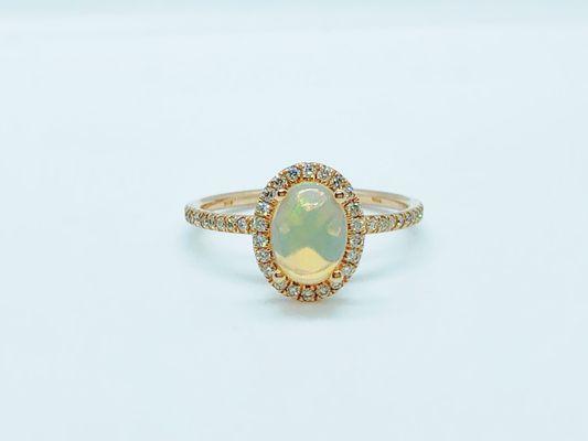 14 karat yellow gold diamond and opal ring