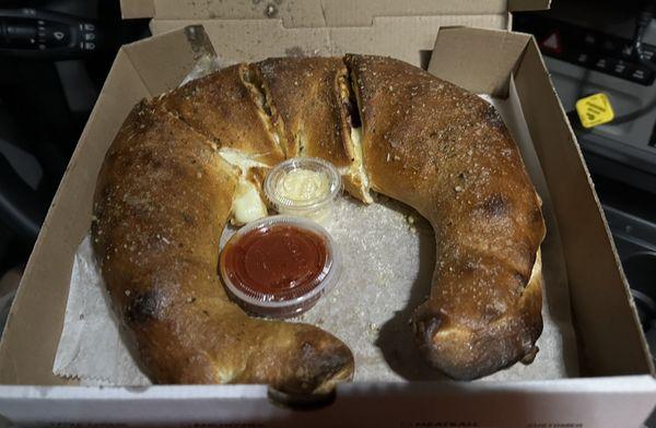 Calzone with pepperoni and extra mozzarella. I had him put some garlic butter on top when it was done. Excellent!