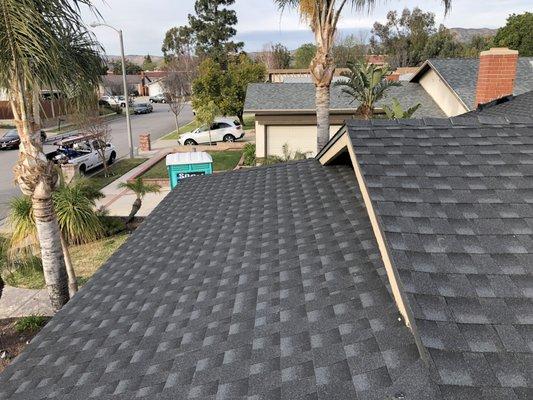 Beautifully installed and set to last a lifetime! Timberline HD Charcoal Shingle with Golden Pledge Warranty.