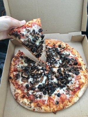 Medium pizza with ample toppings