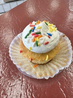 Vanilla & dulce de leche cupcake w/ confetti sprinkles unwrapped