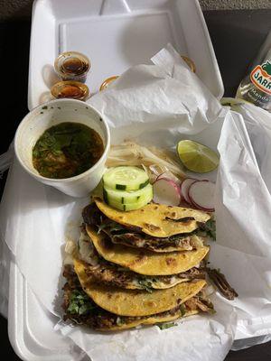 Birria Tacos with the delicious consomé and the fiery chili oil