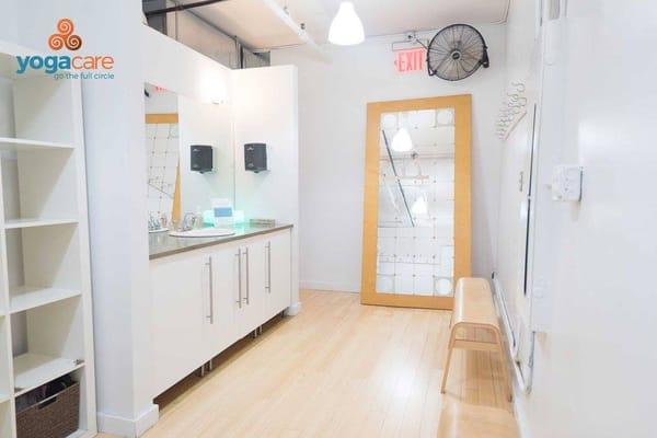 Women's change room complete with showers, shampoo and soap, hair dryer, full length mirror