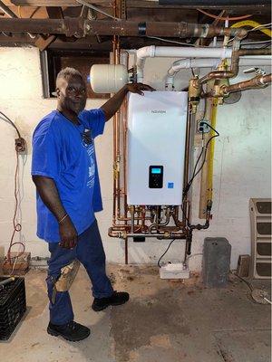 Tankless Combination Water Heater and Hot Water Space Heating.