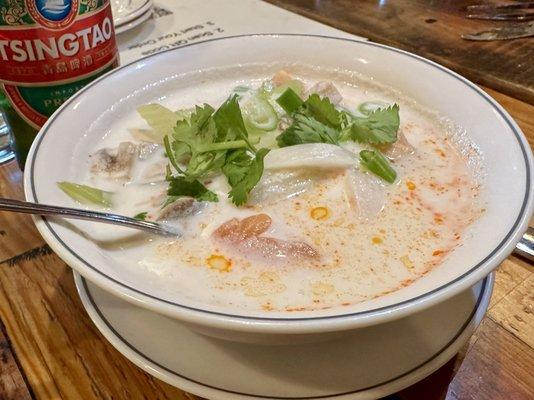 Tom Kha Thai style coconut soup with shrimp, lemongrass, celery, corn, mushroom, onion and lime juice