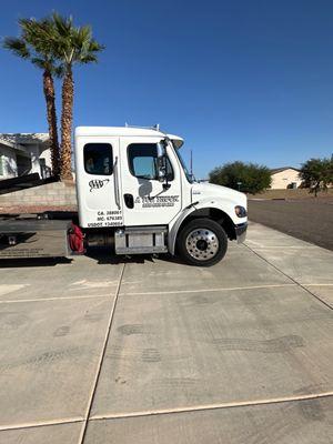 AAA towing service used to load vehicle from garage To repair shop.