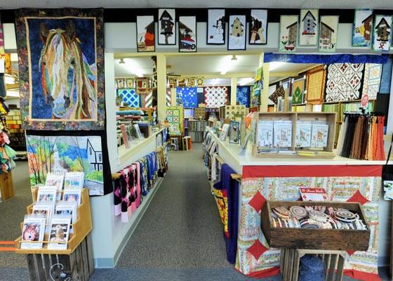 Both stairs and a ramp lead to the lower level of the shop.