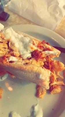 Chicken Shawarma Sandwich with lots of garlic sauce.