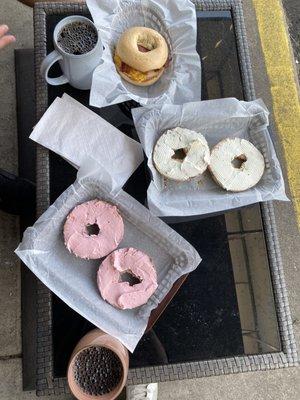 "The American Sandwhich", Everything bagel w/ plain cream cheese, & Blueberry bagel w/ strawberry cream cheese