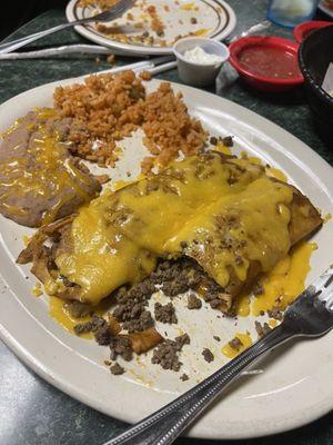 Beef enchiladas with flour tortillas (not disclosed on the menu)