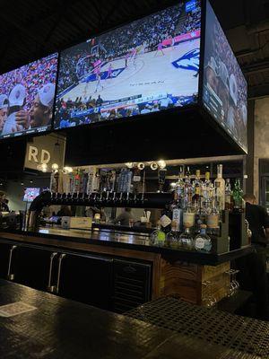 Bar area with lots of TVs