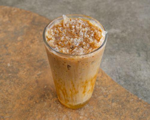 Stay cool and sweeten your day with our Iced Caramel Macchiato - a delightful blend of espresso, creamy milk, and decadent caramel.