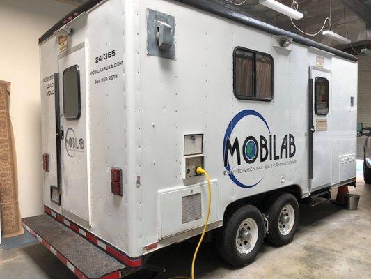 A look at the exterior of our mobile laboratory analyzing lead, asbestos and/or mold in a local warehouse. In 2017, MobiLab USA was awarded