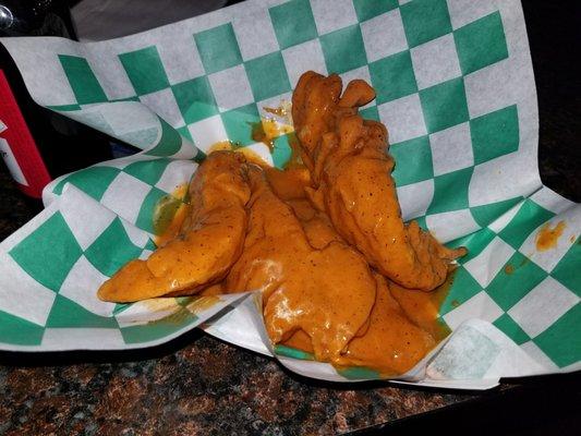 Chicken tenders . Hot sauce. $7 came with blue cheese packets. Supposed to come with celery but did not, neither utensils.