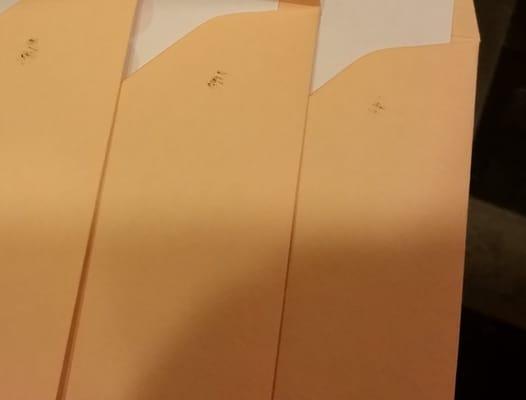 All the envelopes had the small black smudge on the upper right hand corner.