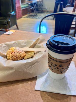 Jalapeno cheddar scone with a cappuccino