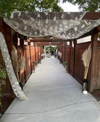 Guest walkway/entrance from parking lot into the ceremony space. Wedding 10/21/23