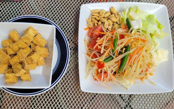 Papaya salad with a side of fried tofu, yum!