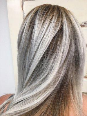 Beautiful blonde color correction . This process takes patience and care . Please advice a consultation before you do a color correction