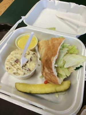 *half eaten* chicken salad pita, potato salad & honey mustard-- so good