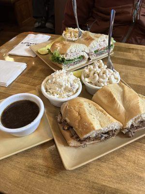 Further plate: Brooklyn Bridge with coleslaw. Closest plate: Titanic with potato salad and macaroni salad