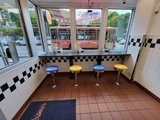 Counter seating at the window.